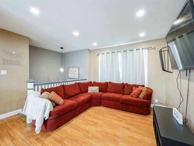 4721 Pine View Dr NE, Cedar Rapids, IA 52402 - living room with light wood-style floors, recessed lighting, and baseboards