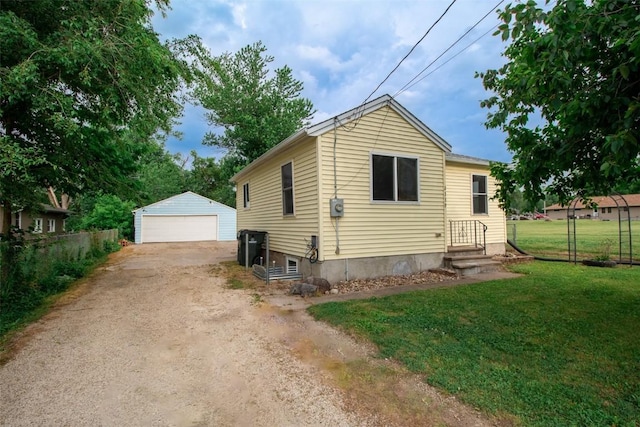 2339 Rompot St SE, Cedar Rapids, IA 52403 - view of property exterior featuring a garage and an outbuilding