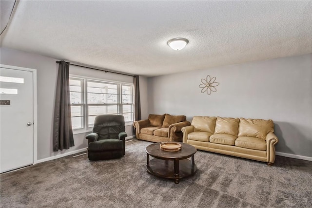 281 NW Jacolyn Dr, Cedar Rapids, IA 52405 - carpeted living room with a textured ceiling and baseboards