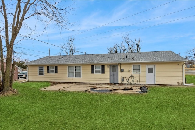 281 NW Jacolyn Dr, Cedar Rapids, IA 52405 - rear view of property with a lawn and a patio