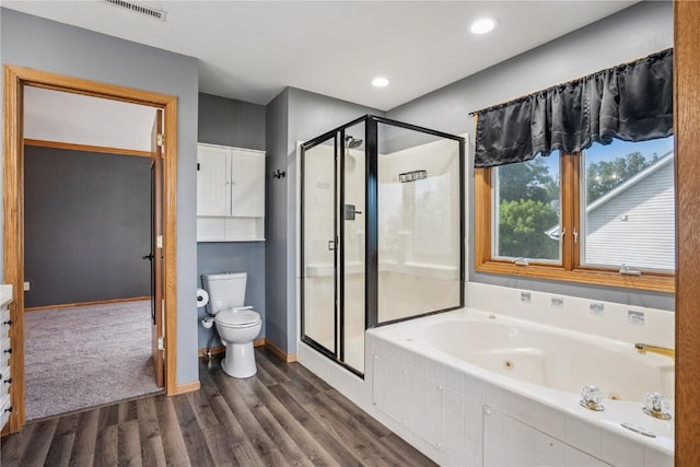 925 Rolling Creek Dr NE, Cedar Rapids, IA 52402 - bathroom with a stall shower, wood finished floors, a jetted tub, and recessed lighting