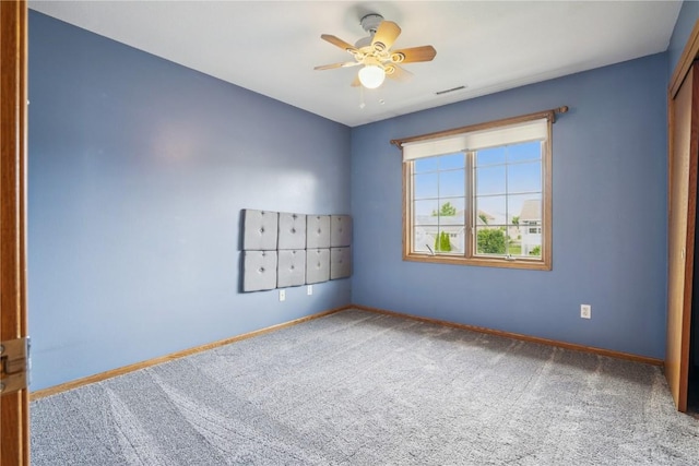 925 Rolling Creek Dr NE, Cedar Rapids, IA 52402 - unfurnished room featuring carpet and ceiling fan