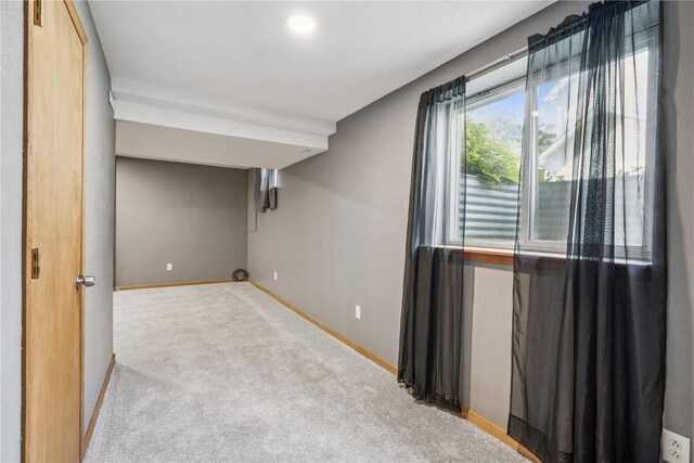 925 Rolling Creek Dr NE, Cedar Rapids, IA 52402 - carpeted spare room featuring baseboards