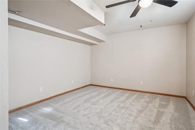 925 Rolling Creek Dr NE, Cedar Rapids, IA 52402 - spare room featuring a ceiling fan and carpet