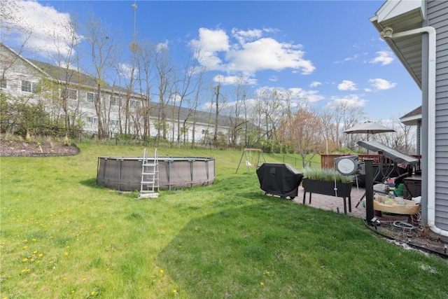 925 Rolling Creek Dr NE, Cedar Rapids, IA 52402 - view of grassy yard featuring an outdoor pool