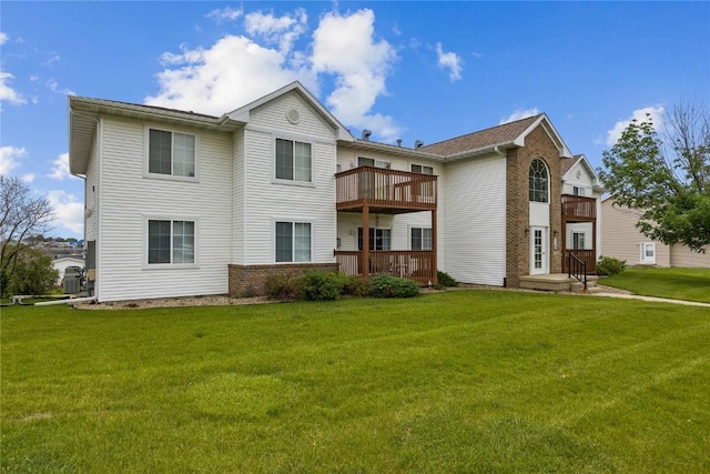 5525 Kacena Ave Unit 7, Marion, IA 52302 - rear view of property featuring brick siding, a lawn, and a balcony