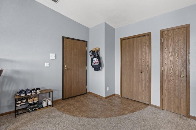 5525 Kacena Ave Unit 7, Marion, IA 52302 - tiled entrance foyer with carpet floors and baseboards