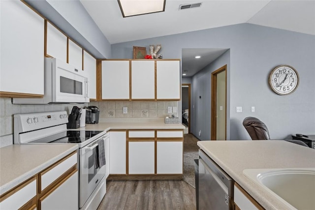5525 Kacena Ave Unit 7, Marion, IA 52302 - kitchen featuring white appliances, vaulted ceiling, wood finished floors, white cabinetry, and light countertops