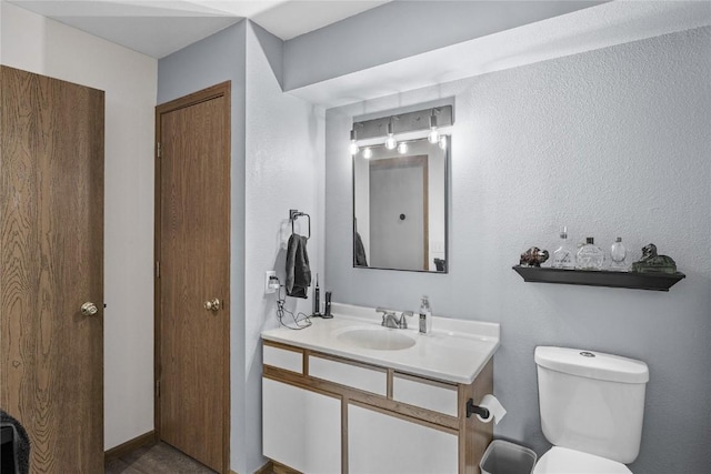 5525 Kacena Ave Unit 7, Marion, IA 52302 - bathroom featuring vanity and toilet