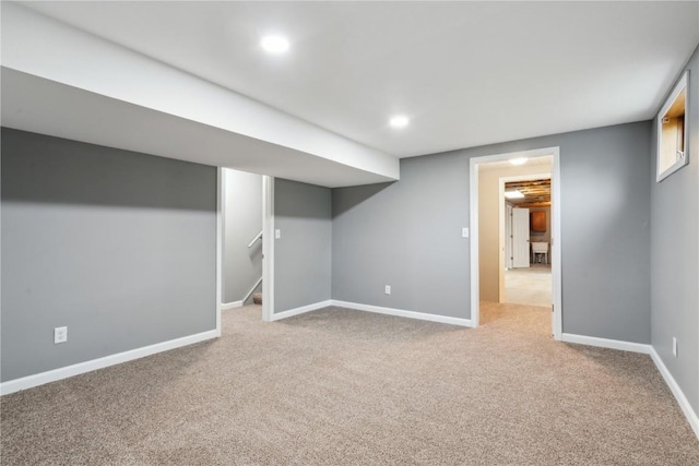 1626 High View Dr, Mount Vernon, IA 52314 - finished below grade area with carpet flooring, baseboards, stairway, and recessed lighting
