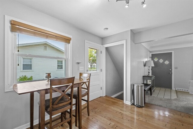 2043 Brookland Dr NE, Cedar Rapids, IA 52402 - dining area featuring hardwood / wood-style flooring and baseboards