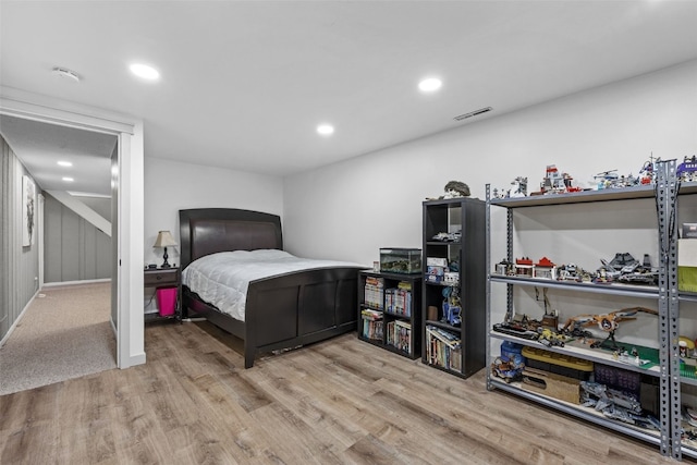 2043 Brookland Dr NE, Cedar Rapids, IA 52402 - bedroom with wood finished floors and recessed lighting