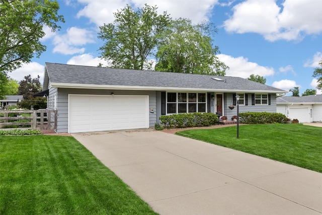 3009 Terry Dr SE, Cedar Rapids, IA 52403 - ranch-style house with driveway and an attached garage