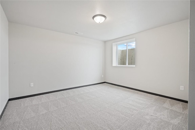 5017 Bluestem St SW, Kalona, IA 52247 - unfurnished room with carpet and baseboards