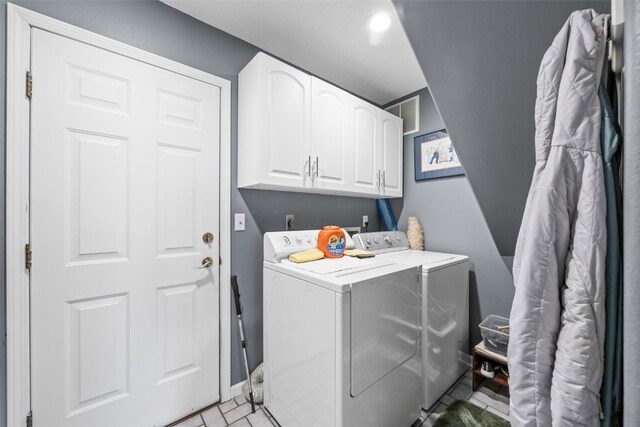 13 S View Dr NE, Iowa City, IA 52240 - laundry room with washer and dryer, cabinet space, recessed lighting, and baseboards