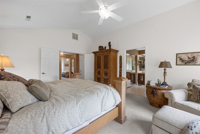 13 S View Dr NE, Iowa City, IA 52240 - carpeted bedroom featuring lofted ceiling, ceiling fan, and connected bathroom