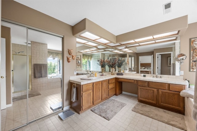 13 S View Dr NE, Iowa City, IA 52240 - bathroom featuring a shower stall, double vanity, and tile patterned flooring