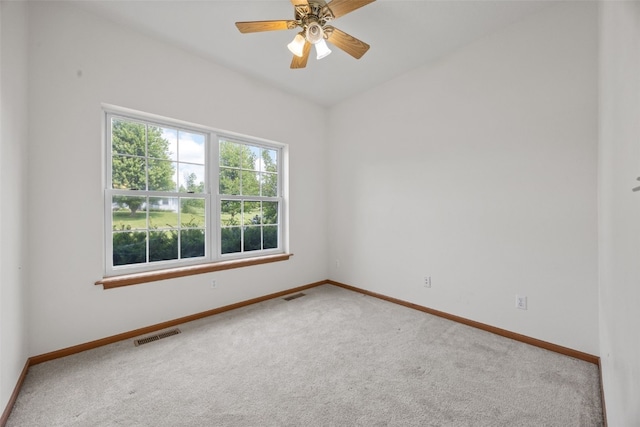3017 Peaceful Dr, Riverside, IA 52327 - carpeted empty room with baseboards and a ceiling fan
