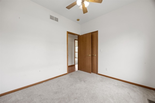 3017 Peaceful Dr, Riverside, IA 52327 - unfurnished room with carpet flooring, ceiling fan, and baseboards