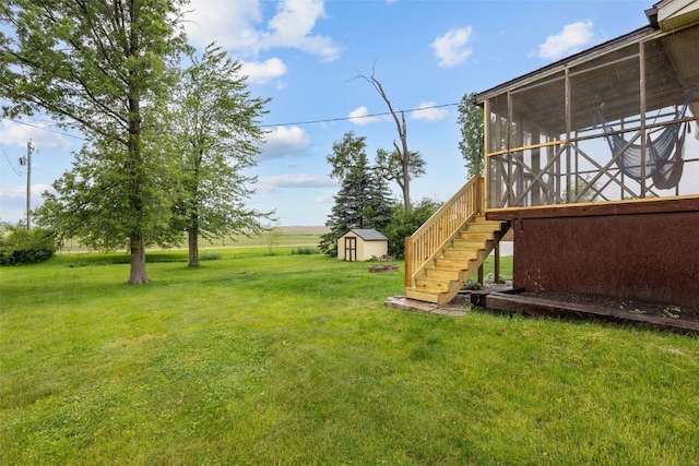 17 C Ave, Newhall, IA 52315 - view of grassy yard with a sunroom and stairs