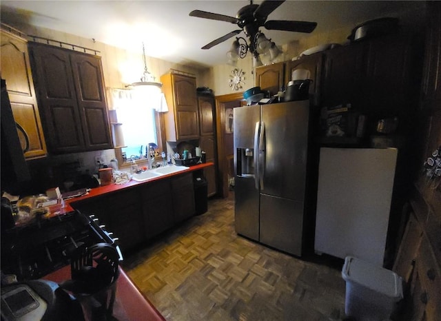 1114 2nd Ave, Vinton, IA 52349 - kitchen with stainless steel refrigerator with ice dispenser, a sink, and ceiling fan