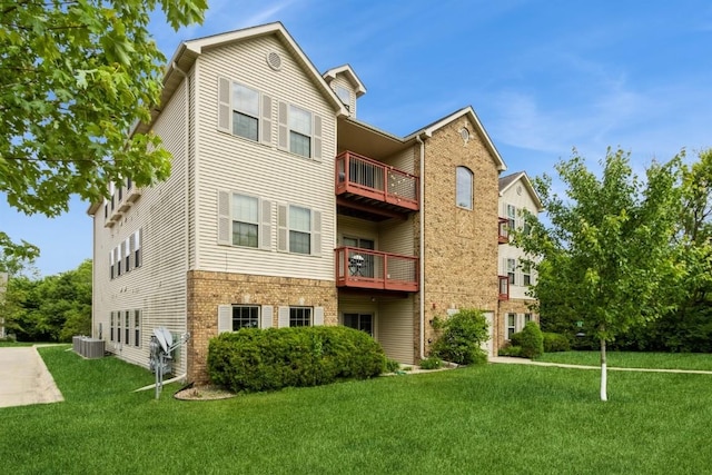 1080 Rachael St Unit 304, North Liberty, IA 52317 - view of building exterior with central AC unit