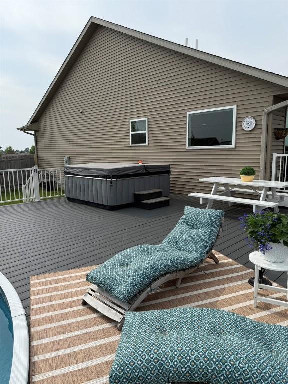 622 Prairie Hill Dr, Atkins, IA 52206 - wooden deck featuring a hot tub