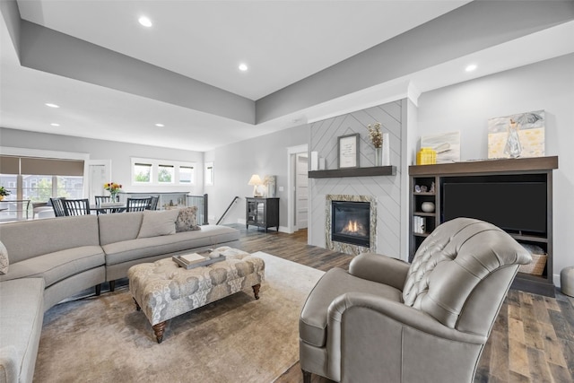 6318 Rapids Ridge Rd NE, Cedar Rapids, IA 52411 - living area with wood finished floors, recessed lighting, a fireplace, and baseboards