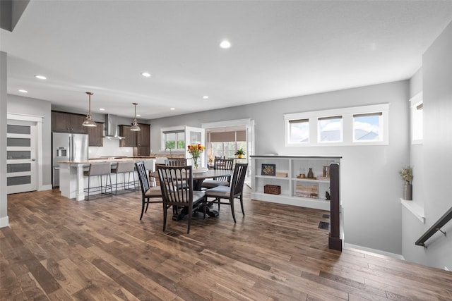 6318 Rapids Ridge Rd NE, Cedar Rapids, IA 52411 - dining area with recessed lighting, dark wood-style floors, and baseboards