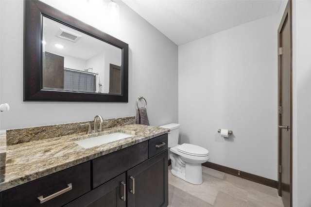 6318 Rapids Ridge Rd NE, Cedar Rapids, IA 52411 - bathroom with vanity, toilet, baseboards, and curtained shower