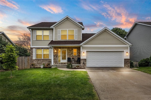 6611 Fox Run Dr SW, Cedar Rapids, IA 52404 - view of front facade featuring driveway, an attached garage, and a shingled roof