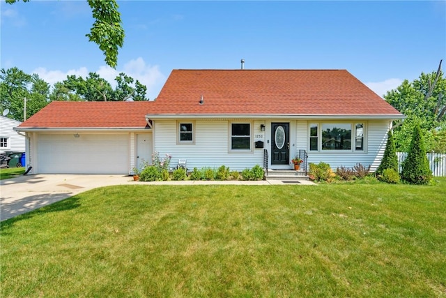 1252 29th St, Cedar Rapids, IA 52402 - view of front of property with a garage and driveway