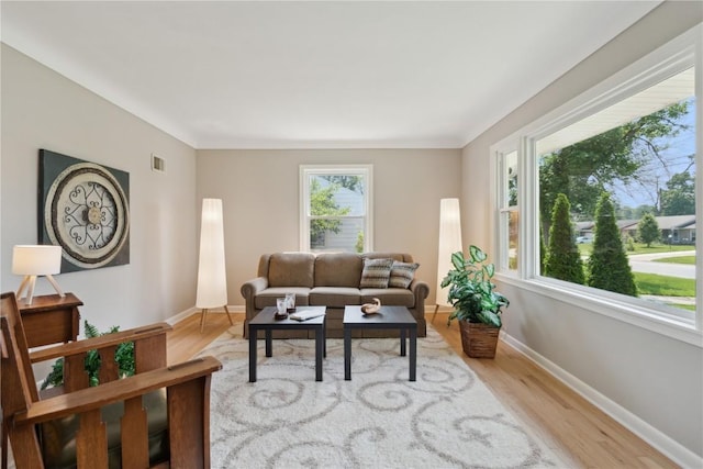 1252 29th St, Cedar Rapids, IA 52402 - living room featuring wood finished floors and baseboards