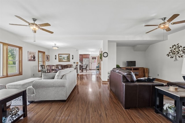 4427 J St SW, Cedar Rapids, IA 52404 - living room featuring ceiling fan, dark wood-style flooring, and baseboards