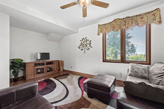 4427 J St SW, Cedar Rapids, IA 52404 - living area with a ceiling fan, baseboards, and wood finished floors