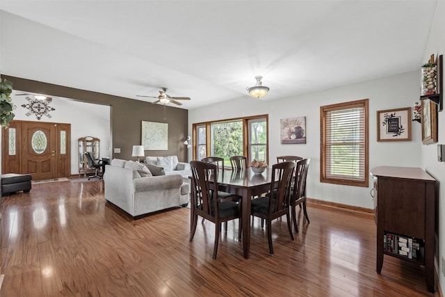 4427 J St SW, Cedar Rapids, IA 52404 - dining area featuring wood finished floors, baseboards, and ceiling fan