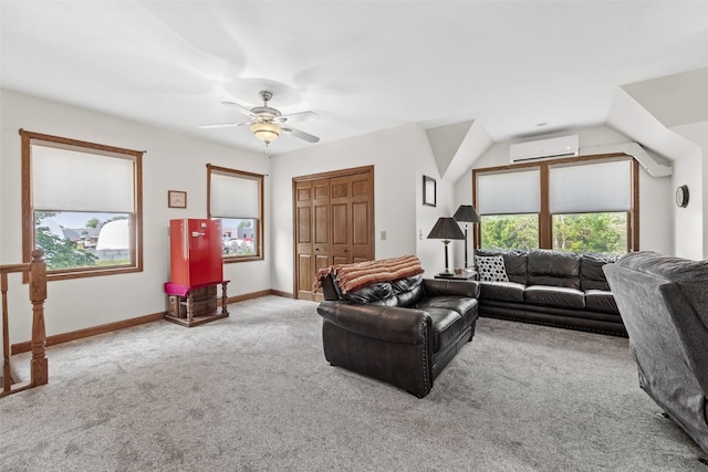4427 J St SW, Cedar Rapids, IA 52404 - carpeted living area featuring a wall mounted AC, a ceiling fan, baseboards, and vaulted ceiling