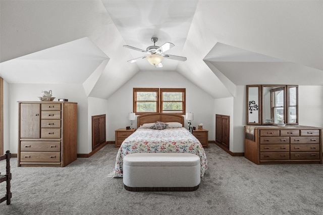 4427 J St SW, Cedar Rapids, IA 52404 - bedroom with carpet, lofted ceiling, baseboards, and a ceiling fan