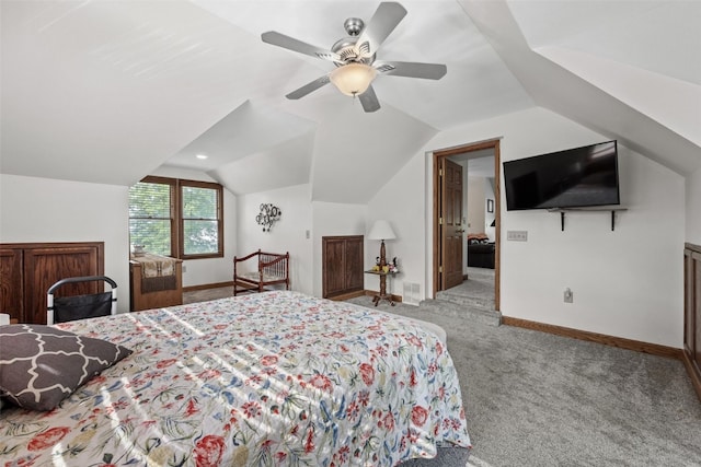 4427 J St SW, Cedar Rapids, IA 52404 - carpeted bedroom featuring lofted ceiling, baseboards, and a ceiling fan