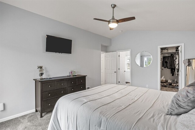 1221 Ronald Way, North Liberty, IA 52317 - bedroom featuring lofted ceiling, carpet floors, baseboards, ceiling fan, and a spacious closet