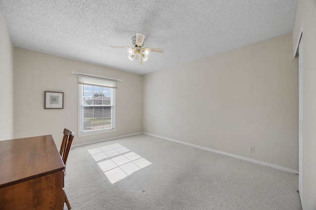 6909 Kent Dr NE, Cedar Rapids, IA 52402 - unfurnished office featuring ceiling fan, carpet floors, a textured ceiling, and baseboards