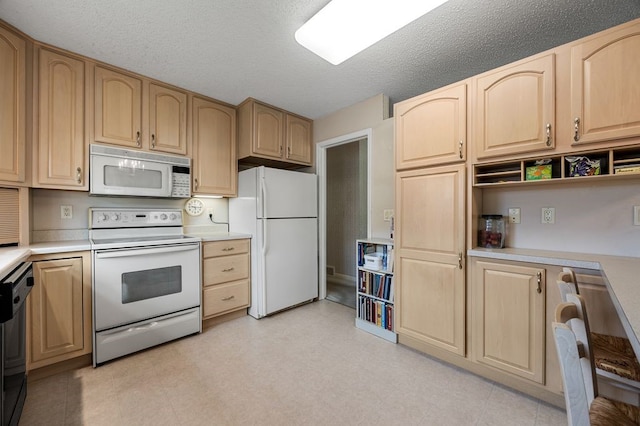 6909 Kent Dr NE, Cedar Rapids, IA 52402 - kitchen with white appliances, light brown cabinets, light countertops, and a textured ceiling