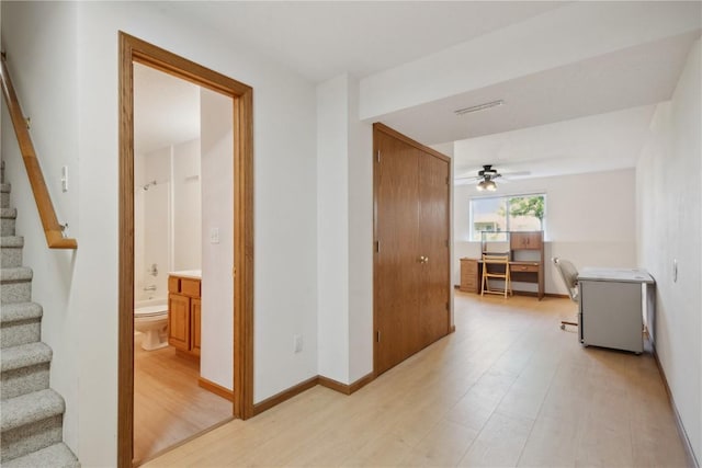 2710 Pheasant Ridge Ct, Marion, IA 52302 - hall with stairs and light wood-style flooring