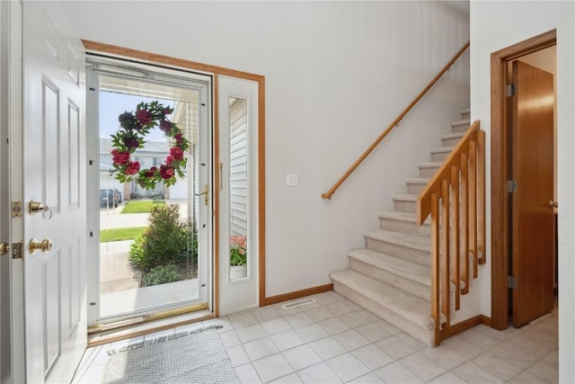 2710 Pheasant Ridge Ct, Marion, IA 52302 - entryway featuring stairs and baseboards