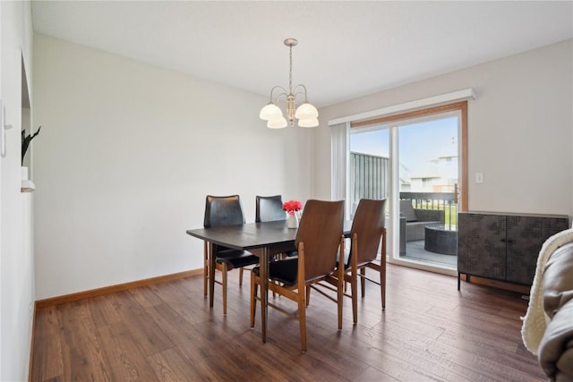 2710 Pheasant Ridge Ct, Marion, IA 52302 - dining space featuring a chandelier, wood finished floors, and baseboards
