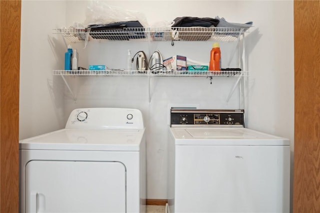 2710 Pheasant Ridge Ct, Marion, IA 52302 - washroom with washing machine and clothes dryer