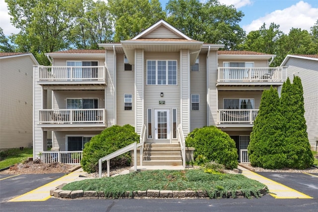 3511 E Ave NW Unit D, Cedar Rapids, IA 52405 - view of building exterior with uncovered parking
