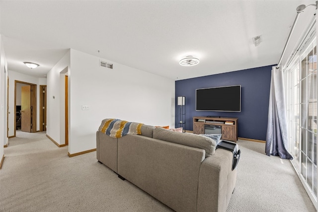 3511 E Ave NW Unit D, Cedar Rapids, IA 52405 - living room with light colored carpet and baseboards