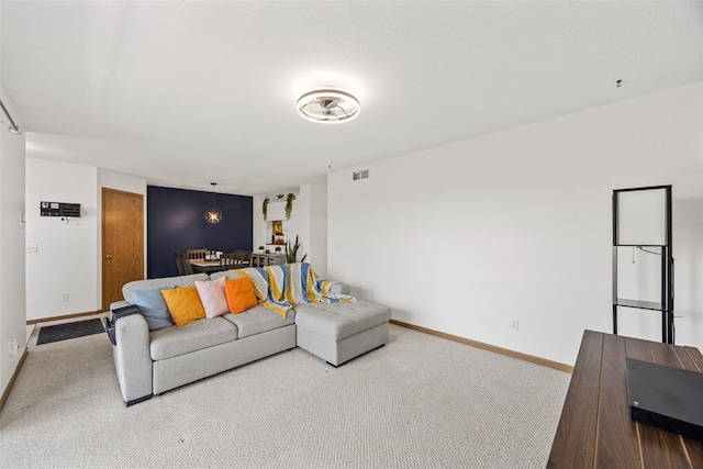 3511 E Ave NW Unit D, Cedar Rapids, IA 52405 - carpeted living room with baseboards