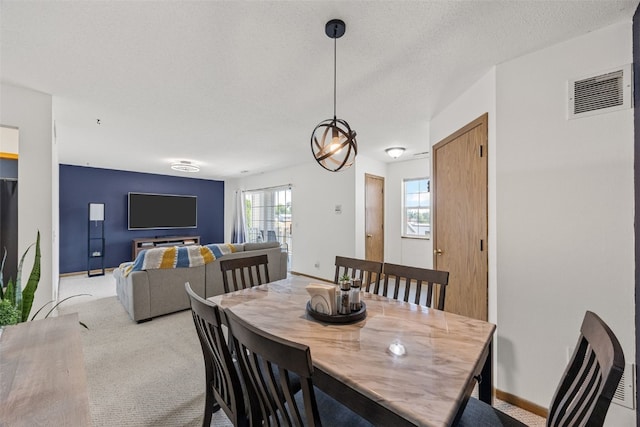 3511 E Ave NW Unit D, Cedar Rapids, IA 52405 - dining area with light colored carpet and baseboards
